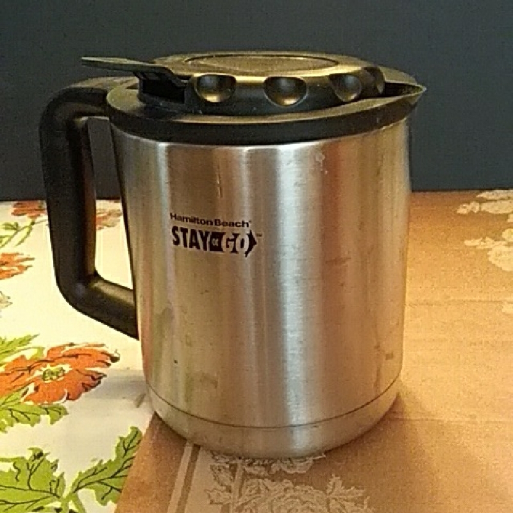 10/$10  Hamilton Beach Silver Travel Mug with Black Handle
